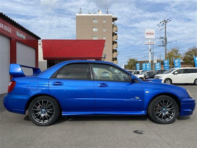 スバル　インプレッサ　WRX　2003　V-Limited　4WD/MOMOステアリング/社外足回り/フジツボ技研マフラー/社外ナビゲーション/オートエアコン/社外アルミホイール/ETC/レーダー/取説