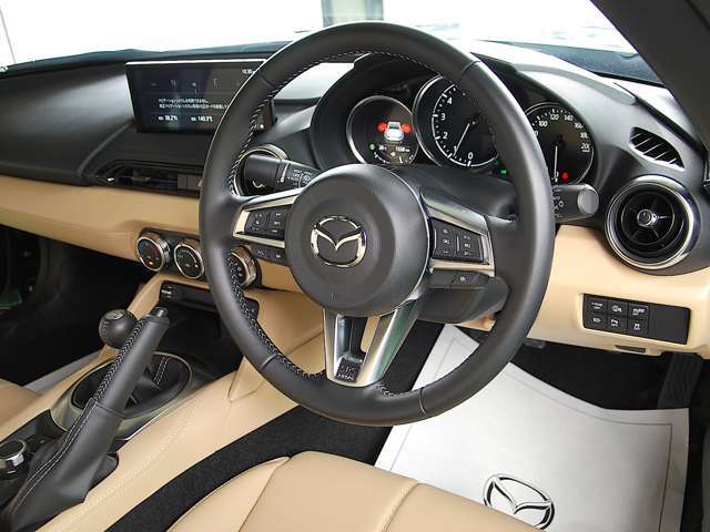The cockpit's driver-centric design lets you intuitively control everything. It deepens the Jinba Ittai experience, creating the ultimate driving space with Mazda's technology.