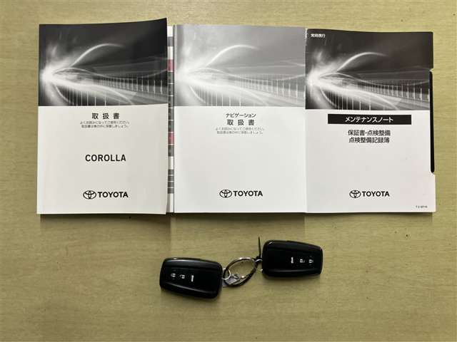 メンテナンスノートと備え付けのカギの画像になります。