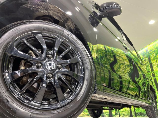 【ホンダ14インチアルミホイール】外観にマッチしたメーカーアルミホイールを装着しております。各種社外アルミホイールや、スタッドレスタイヤも取扱いしております。是非ご相談ください♪