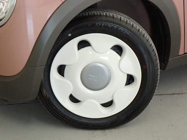 花型がかわいいホイールキャップ装着☆　タイヤサイズは、155/65R14です。