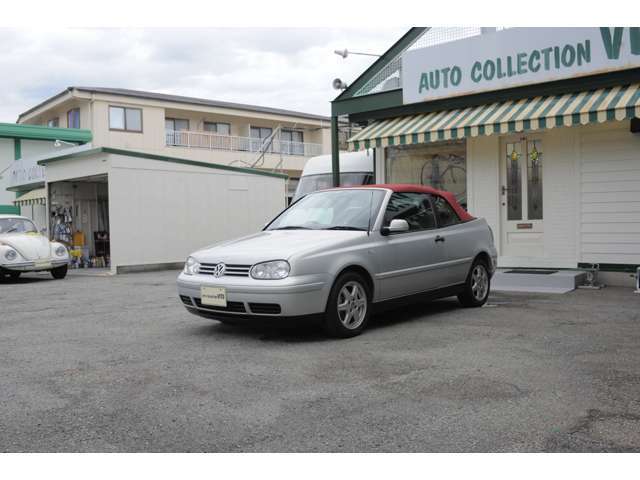 左斜前方、新品ソフトトップ（赤キャンバス地）