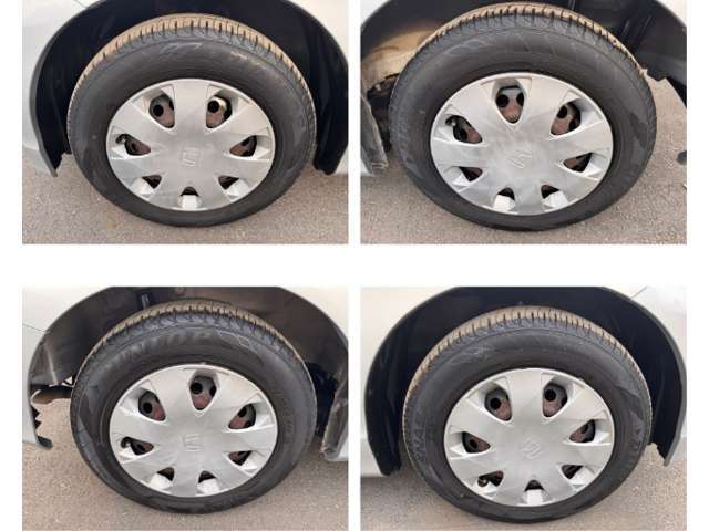 185/65R15サイズのタイヤを履いています。専用デザインのホイールカバーで足元が締まります。