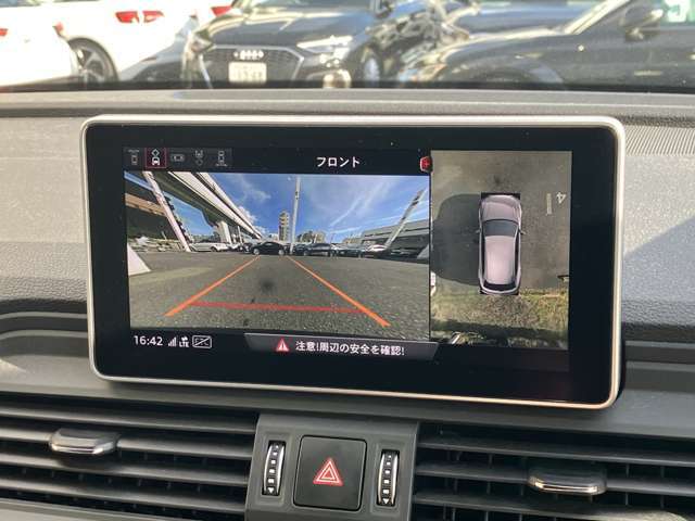 サラウンドビューカメラ装備　車両の4つのカメラから得た映像を合成し、上空から眺めているような映像をモニターに映し出します。車両周辺の歩行者や障害物などの発見に役立ちます。