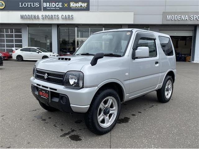 スズキ　ジムニー　XG　4WD/オートマ車/社外フルセグナビゲーション/背面タイヤあり/ヘッドライトレベライザー/ワイヤレスキー/社外アルミホイール