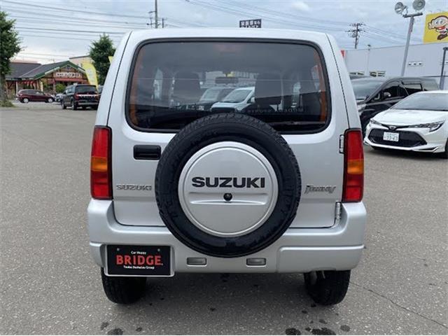スズキ　ジムニー　XG　4WD/オートマ車/社外フルセグナビゲーション/背面タイヤあり/ヘッドライトレベライザー/ワイヤレスキー/社外アルミホイール