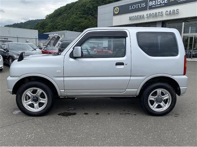 スズキ　ジムニー　XG　4WD/オートマ車/社外フルセグナビゲーション/背面タイヤあり/ヘッドライトレベライザー/ワイヤレスキー/社外アルミホイール