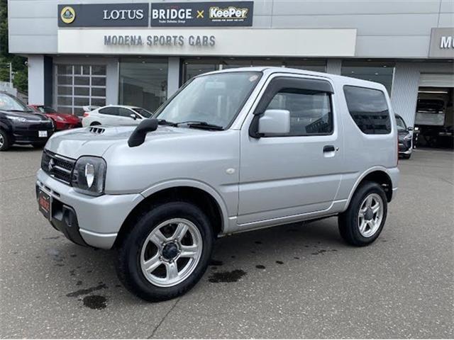 スズキ　ジムニー　XG　4WD/オートマ車/社外フルセグナビゲーション/背面タイヤあり/ヘッドライトレベライザー/ワイヤレスキー/社外アルミホイール