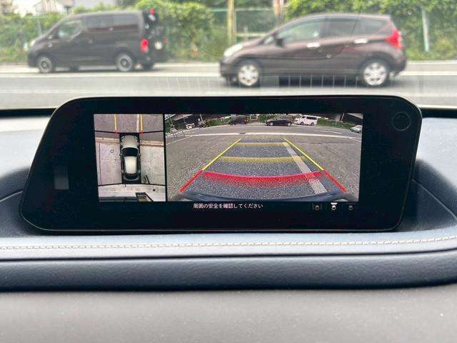 CX-30入庫致しました！人気装備の360°セフティーパッケージ装着！お写真の全方位カメラ機能、ナビゲーション機能、TV視聴・CD/DVD視聴・Bluetoothオーディオなど性能は多岐に渡ります。