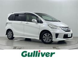 ホンダ フリードハイブリッド 1.5 ジャストセレクション 両側電動スライドドア　バックカメラ　ビル