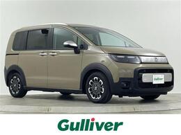 ホンダ フリード 1.5 e:HEV クロスター 登録済未使用車 両側電動 BSM 追従走行 LED