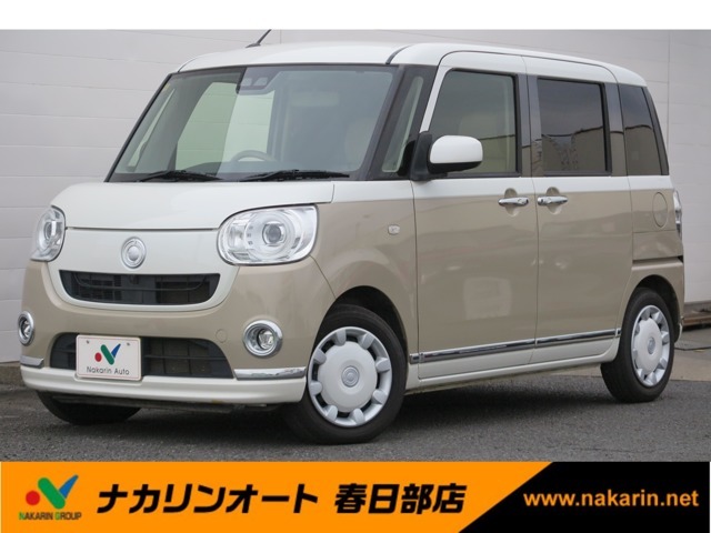 ベージュツートンのムーブキャンバス入庫しました。大きなナビが付いています。