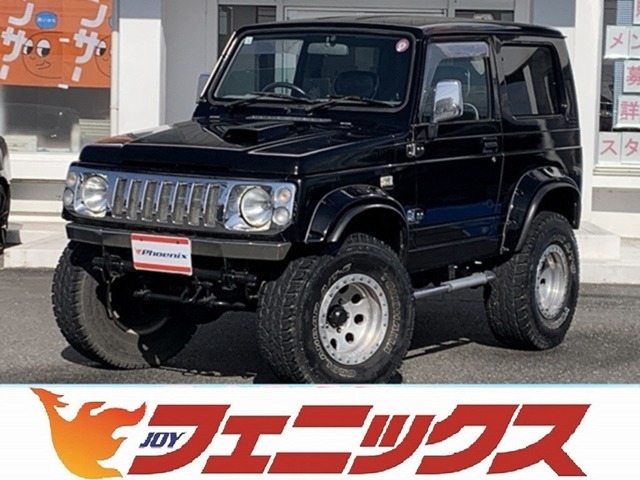 普通登録車☆切り替え式4WD☆ICターボ☆シートワン革調張り替え☆ジオランダーATタイヤ☆社外マフラー☆JIMUKENスポーツコイル☆2インチリフトアップ☆ETC☆背面タイヤ☆A/C☆P/W☆試乗OK
