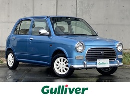 ダイハツ ミラジーノ 660 社外Dオーディオ白ホイール木目調パネル