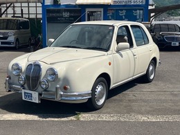 光岡自動車 ビュート 1.0 デラックス 