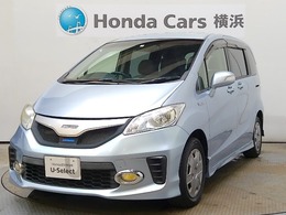 ホンダ フリードハイブリッド 1.5 ジャストセレクション 6人　メモリーナビ　リアカメラ　ETC　両側