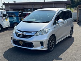 ホンダ フリードハイブリッド 1.5 ジャストセレクション 7人乗り/ナビ/TV・Bカメラ/両側電動