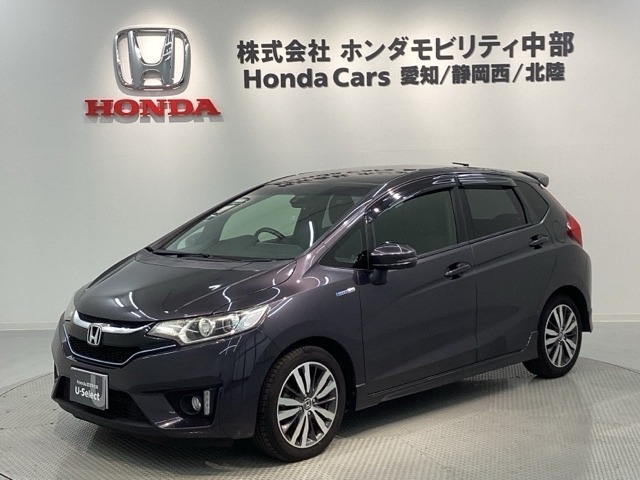 全国納車可 第三者機関証明書付 あんしんPKG 1年保証 ワンオ-ナ- ナビVXM-165VFEi TV Rカメラ BTオ-ディオ DVD ETC VSA装備のフィットハイブリッド Sパッケージ入庫！