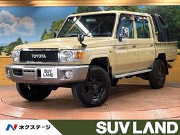 トヨタ ランドクルーザー70ピックアップ 4.0 4WD 5MT トレイルロールバー 禁煙車 SDナビ バ