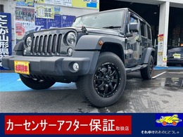 ジープ ラングラー アンリミテッド スポーツ 4WD 25100kmワンオーナー禁煙車バックカメラ