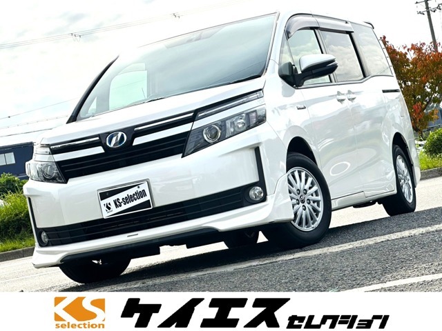 H27　トヨタ　ヴォクシー　ハイブリッドV　ワンオーナー　スマートキー　プッシュスタート　両側電動スライドドア　クルーズコントロール　アルパインナビ　TV　フリップダウンモニター　TRDスポイラー