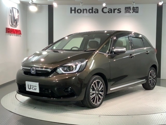 全国納車可 第三者機関証明書付 革シ-ト 1年保証 ナビVXU-215FTi フルセグ Rカメラ CD録音 BTオ-ディオ DVD ドラレコ ETC VSA装備のフィット e:HEVリュクス入庫！