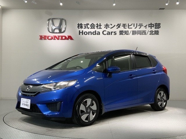 全国納車可 第三者機関証明書付 1年保証 ナビVXM-145VSi TV Rカメラ DVD VSA スマ-トキ- 盗難防止装置 整備記録簿 AAC装備のフィットハイブリッド Fパッケージ入庫！