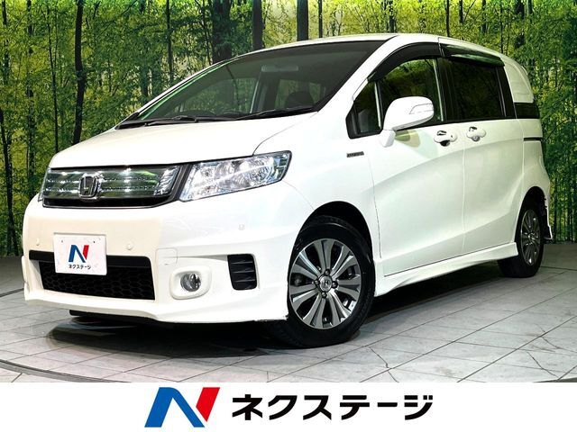 両側電動ドア　純正ナビ　バックカメラ　禁煙車　ハーフレザーシート