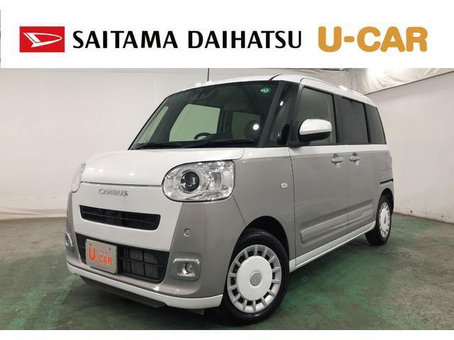 走行少な目9950キロ　白×グレーのムーヴキャンバス入荷しました♪可愛すぎない落ち着きのあるグレーが良いですよね?♪新品ナビがついているので安心してお乗りいただけます（＾＾♪