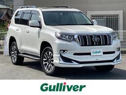 トヨタ ランドクルーザープラド 2.7 TX Lパッケージ 4WD モデリスタ Mナビ 全方位 SR 革 7人 19AW