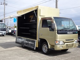 いすゞ エルフ 荷台左右跳上 荷台展示スペース 5MT ガソリン車 NOx・PM適合