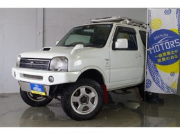 スズキ ジムニー 660 ワイルドウインド 4WD 自社分割/4年保証付/社外ナビ/マフラー