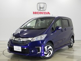 ホンダ フリードハイブリッド 1.5 ジャストセレクション 禁煙車・ナビ・Rカメラ・HID・オートライト