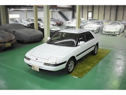 マツダ ファミリアアスティナ 1.5 DOHC 記録簿10枚　保証書　取説　5速MT