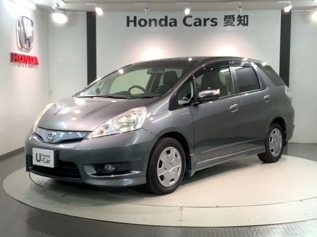 全国納車可 第三者機関証明書付 1年保証 ナビVXM-135VFNi TV Rカメラ CD録音 DVD ETC HID VSA クルコン装備のフィットシャトルハイブリッド スマートセレクション入庫！