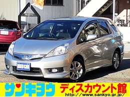 ホンダ フィットシャトルハイブリッド 1.3 ナビプレミアムセレクション 禁煙車/HDDナビTV/バックカメラ/キセノン