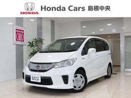 ホンダ フリードハイブリッド 1.5 ジャストセレクション+ ナビ　バックカメラ　ETC　VSA　ディスチャ