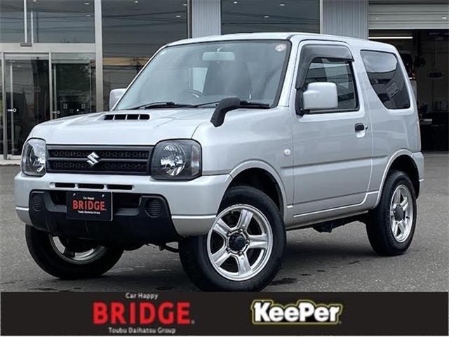スズキ　ジムニー　XG　4WD/オートマ車/社外フルセグナビゲーション/背面タイヤあり/ヘッドライトレベライザー/ワイヤレスキー/社外アルミホイール