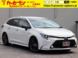 トヨタ カローラツーリング 1.8 ハイブリッド WxB E-Four 4WD 9インチナビ　バックカメラ　シートヒータ