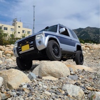 三菱 パジェロミニ エクシード_4WD(AT_0.66)