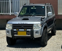 三菱 パジェロミニ エクシード_4WD(AT_0.66)