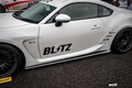 「ブリッツが発売前のトヨタGR86をワイドボディ化！」グラマラスなフロントバンパーが強烈な個性を放つ
