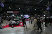 入口の大迫力なレーシングカー展示は「オートメッセ」名物！　　「スーパーGT」ブースは３台のGT500マシンで来場者をお出迎え【AMA2025】