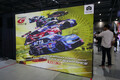 入口の大迫力なレーシングカー展示は「オートメッセ」名物！　　「スーパーGT」ブースは３台のGT500マシンで来場者をお出迎え【AMA2025】