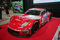 入口の大迫力なレーシングカー展示は「オートメッセ」名物！　　「スーパーGT」ブースは３台のGT500マシンで来場者をお出迎え【AMA2025】