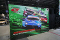 入口の大迫力なレーシングカー展示は「オートメッセ」名物！　　「スーパーGT」ブースは３台のGT500マシンで来場者をお出迎え【AMA2025】
