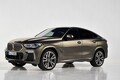 独BMW、新型「X6」を初公開。先代よりロー＆ワイドに進化